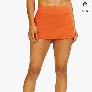 orange tennis skirt